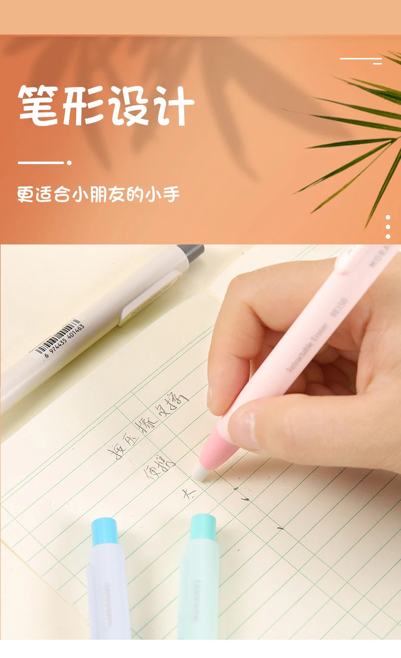 A hand is using a pink retractable pencil eraser on lined paper, with other pens and erasers visible.
