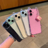 A collection of iPhone cases in various colors and designs, including pink, white, and black, displayed on a hand.