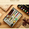 A display of a luxury fountain pen set with various pens and a wax seal kit arranged on a wooden surface.