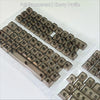 Eine Sammlung durchsichtiger Kirschprofil-Keycaps für mechanische Tastaturen in einer Kunststoffhülle.