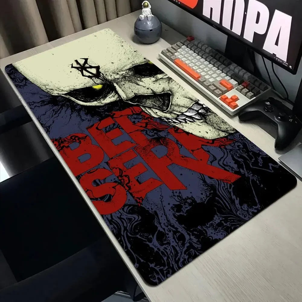 A large gaming desk mat featuring a stylized Berserk skull design for a mouse pad.