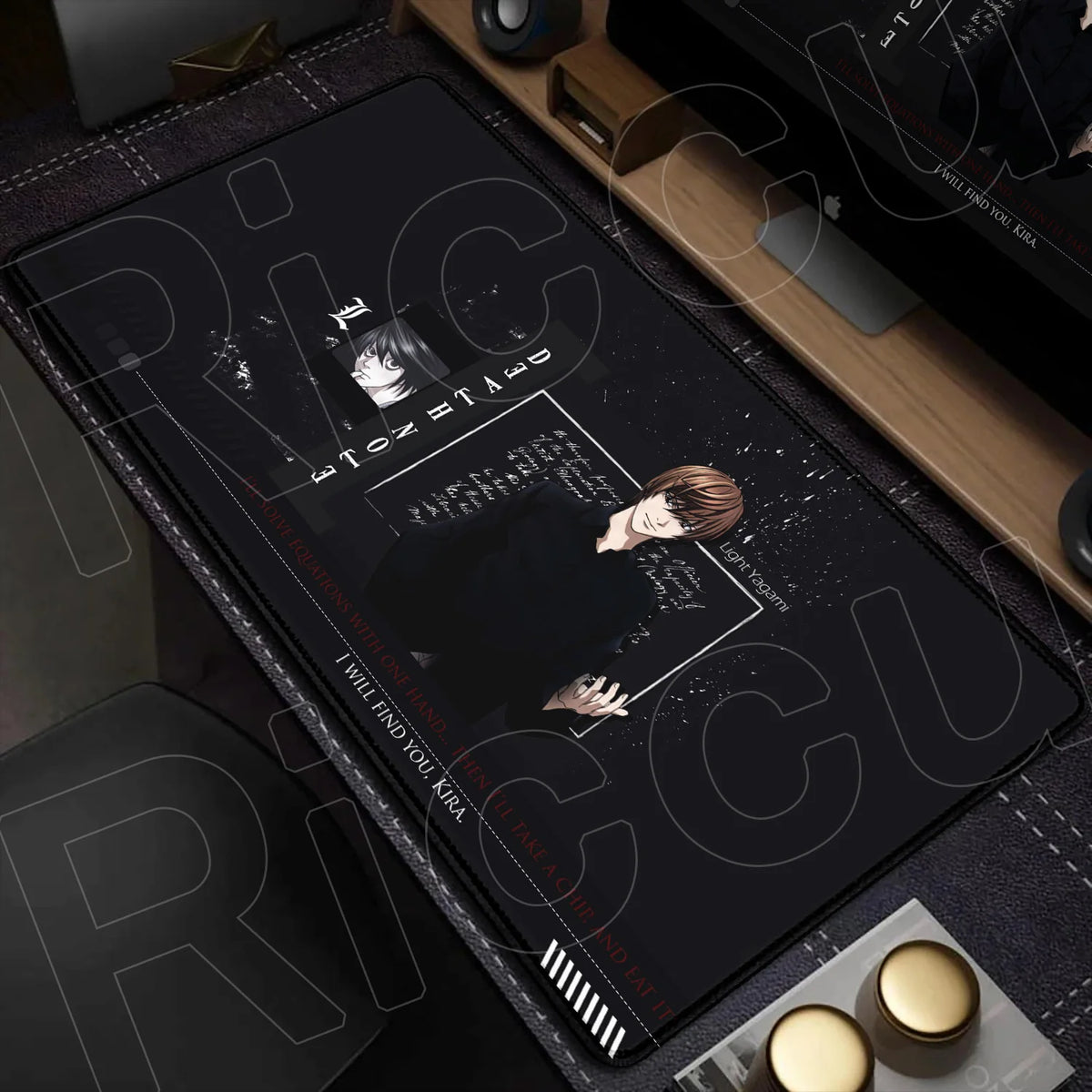 A black oversized desk mat featuring a Death Note design with characters and text for gaming or office use.