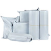 A collection of white, durable self-adhesive courier mailer bags in various sizes and formats.