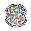 An enamel pin design featuring a stylized virus shape with the text What doesn't kill you mutates and tries again
