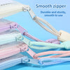 Close-up of various colored waterproof mesh zipper document pouches and file folders