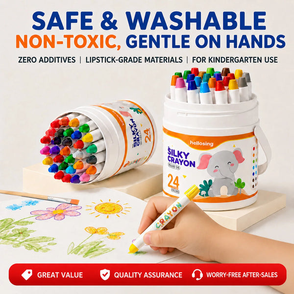 A hand holds a white plastic container of silicone crayons for kindergarten use with colorful tips and an elephant design.