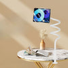 A 360° rotating tablet and phone stand with a flexible spiral base resting on a marble table.