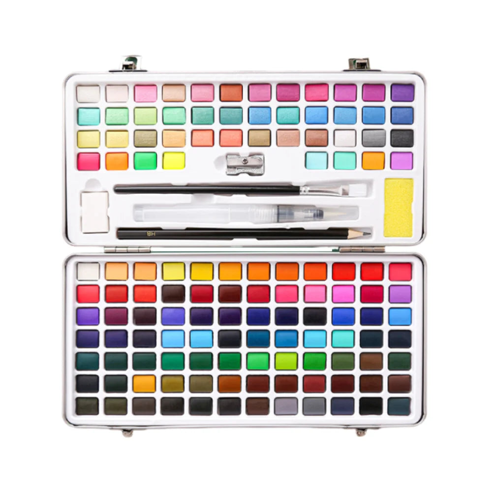 A rectangular metal palette containing a solid watercolor paint set with brushes and numerous colored paint pans.