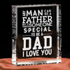 A clear glass block engraved with the text Any man can be a father but it someone special to be a dad I love you