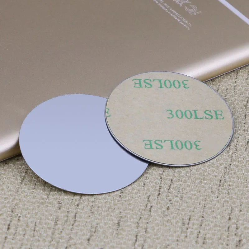 Two round magnetic mount plates labeled 300LSE are shown on a beige surface.