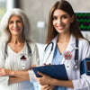 A smiling woman in a white lab coat holds an acrylic nurse badge reel.