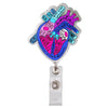 An anatomical diagram badge reel featuring a colorful illustration of the human heart.