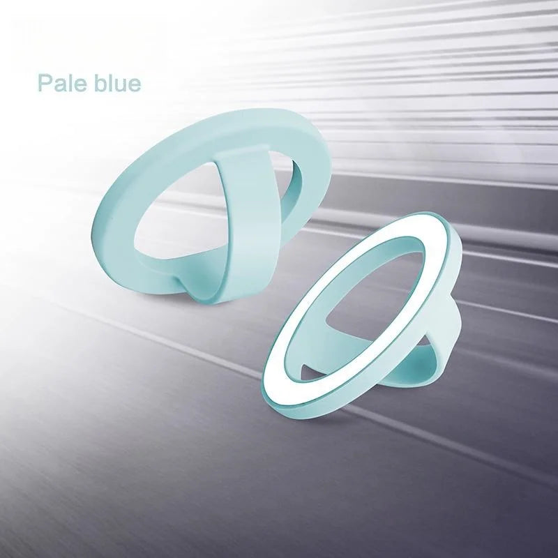 Pale blue magnetic silicone phone grip with a foldable stand shown in a close-up view.