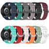 A variety of silicone watch bands in multiple colors, including blue, green, gray, purple, and orange, displayed together.