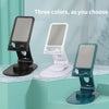Three colors of a 360° rotating adjustable desktop phone and tablet stand displayed on a surface.
