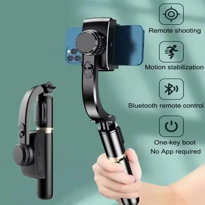 A black Bluetooth selfie stick with an LED fill light and tripod stand being held by a hand.