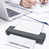 A close-up of a black thermal paper contract agreement being printed on an A4 thermal paper printer.
