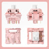 Pink linear mechanical keyboard switches shown in various forms and angles