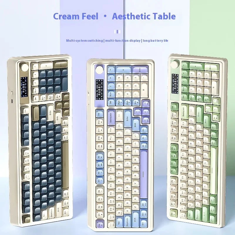 A close-up view of a cream-colored multi-system switching aesthetic table keyboard with light green accents.
