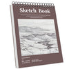 A spiral-bound sketch book with a cover featuring a landscape drawing.