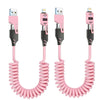 A pair of pink retractable 4-in-1 fast charging cables with 65W USB-C adapters.
