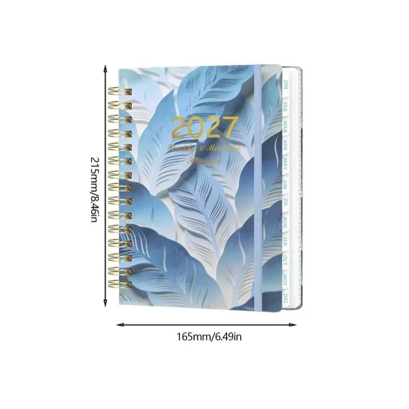 A spiral bound planner featuring blue feather designs and monthly tabs.