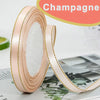 Roll of pink satin ribbon with gold edge for wrapping or crafting