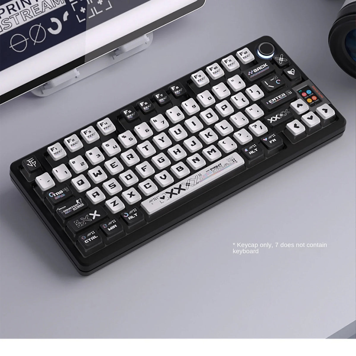 A close-up view of a black mechanical keyboard featuring transparent pudding style PBT keycaps for CSGO gaming.