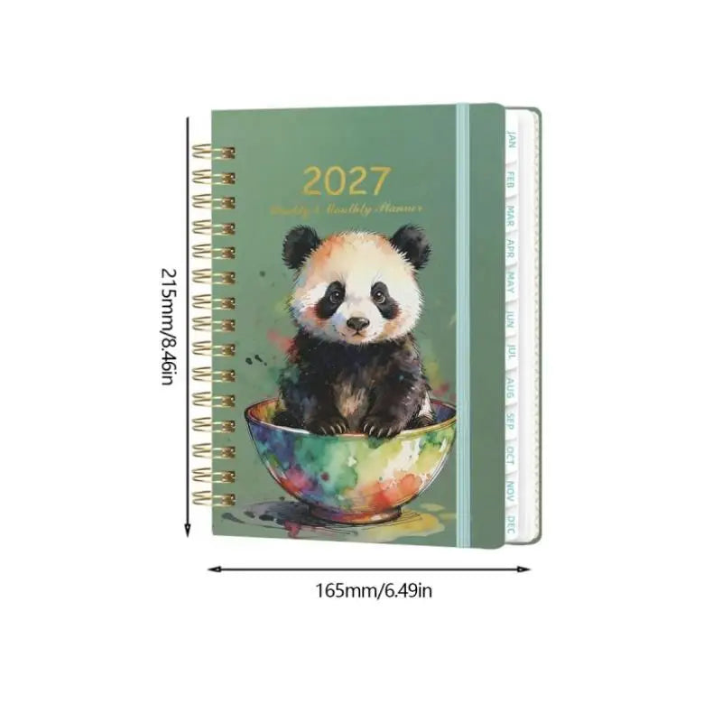 A green spiral bound planner featuring a cute panda illustration on the cover.