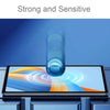 A close-up of a tablet screen displaying colorful light patterns, with a glass protector being applied.