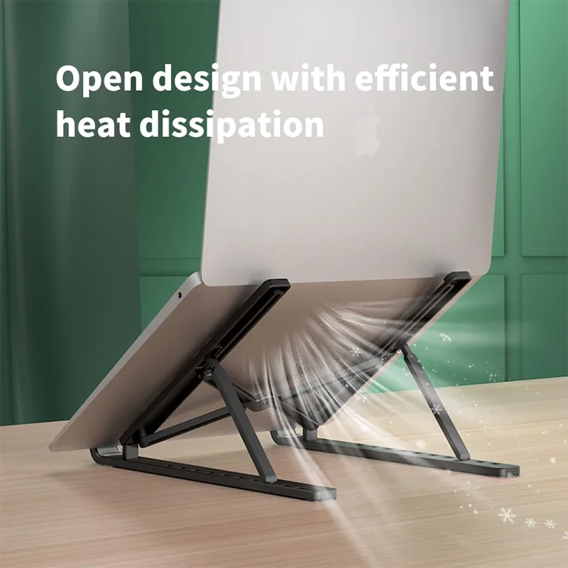A silver laptop is supported by a black foldable stand, demonstrating efficient heat dissipation.