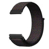 A black nylon loop watch strap with a multicolored, textured pattern shown from the side.