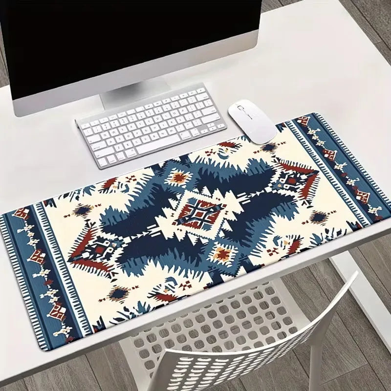 A vintage Persian rug patterned gaming mouse pad with a non-slip rubber base is displayed on a white desk.