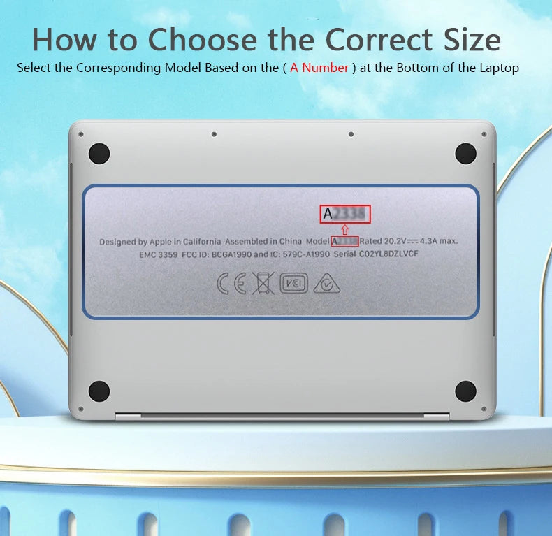 A laptop with a blue screen protector showing model information and certification marks