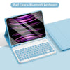 A light blue iPad case with a Bluetooth keyboard is shown open, displaying a colorful graphic on the screen.
