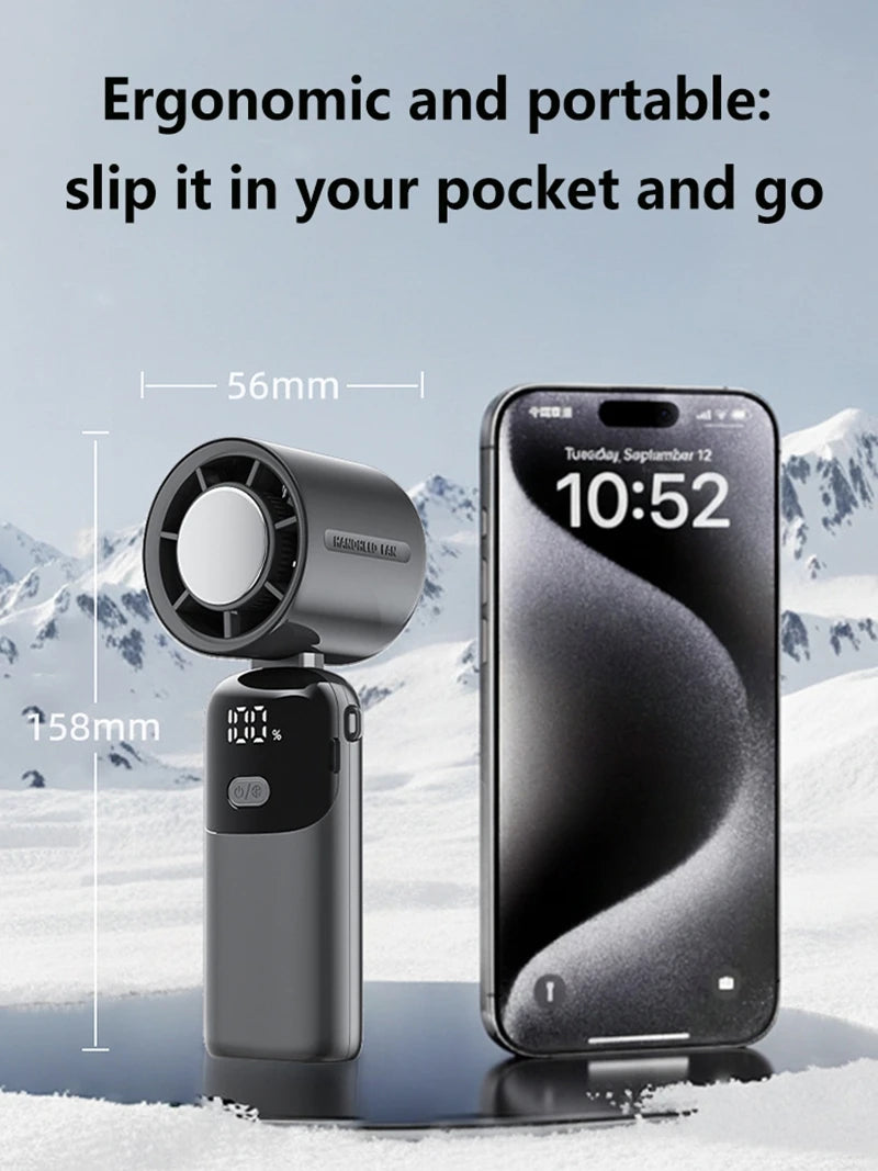 A portable handheld cooling fan is shown next to a smartphone, demonstrating its ergonomic and portable design.