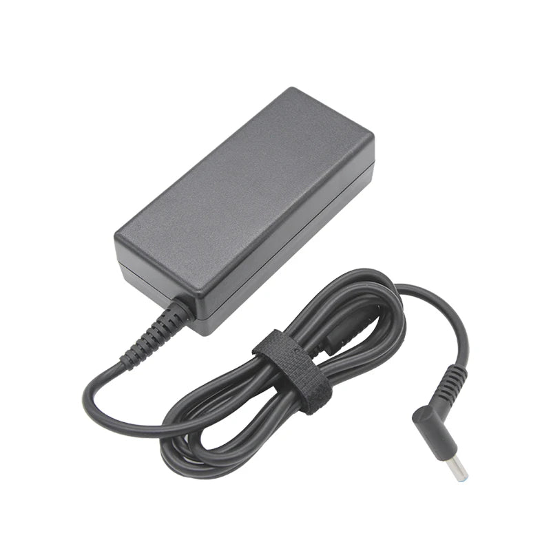 A compact, gray high-power laptop charger adapter with a black cable.