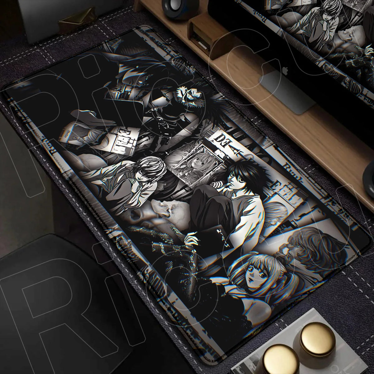 An oversized black mouse pad featuring a dark, stylized illustration of characters from Death Note.