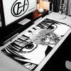 Extra large gaming mouse pad featuring a stylized black and white illustration of an eye.