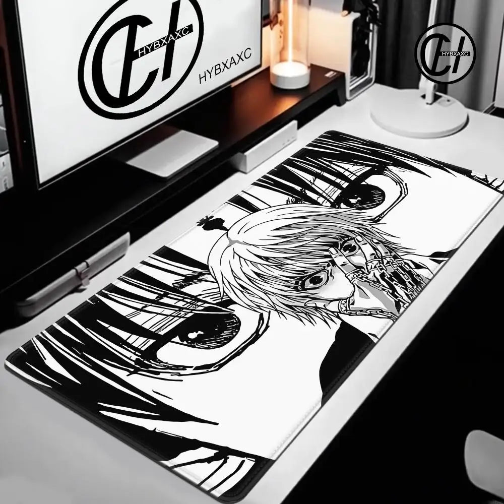 Extra large gaming mouse pad featuring a stylized black and white illustration of an eye.