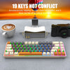 A compact 68-key wired mechanical gaming keyboard is shown with various keys and accessories on a gray surface.