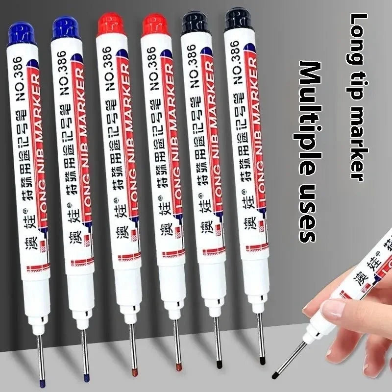 A collection of long tip marker pens in various colors and designs shown alongside a hand using one of the markers.