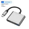 A silver 4-in-1 USB-C docking station with HDMI and USB ports shown from above.