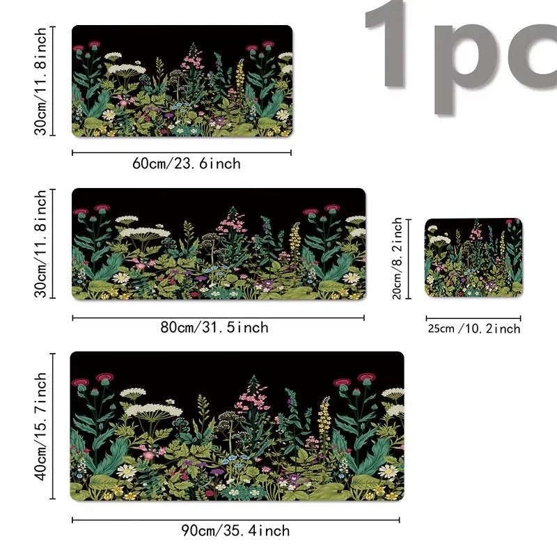 A set of three floral design mouse pads with non-slip rubber bases in various sizes and colors.