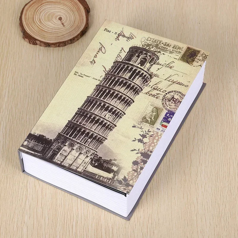A small book featuring an old-style illustration of the Leaning Tower of Pisa, used as a mini dictionary safe.