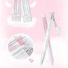 A set of four Angel Gel Pens in pink and white shades are displayed against a light pink background.