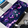 A dark purple and pink themed XXL Gengar gaming mouse pad featuring a vibrant, stylized monster print.