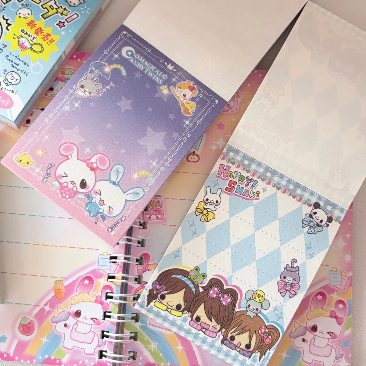 A collection of colorful decorative memo pads featuring cute characters and patterns.