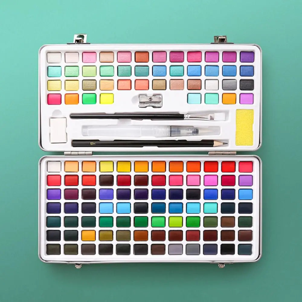 A white watercolor paint set with a brush and a palette of solid colored paints.