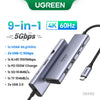 موزع فضي متعدد المنافذ مزود بمنافذ HDMI و USB-C وقدرات نقل بيانات متنوعة